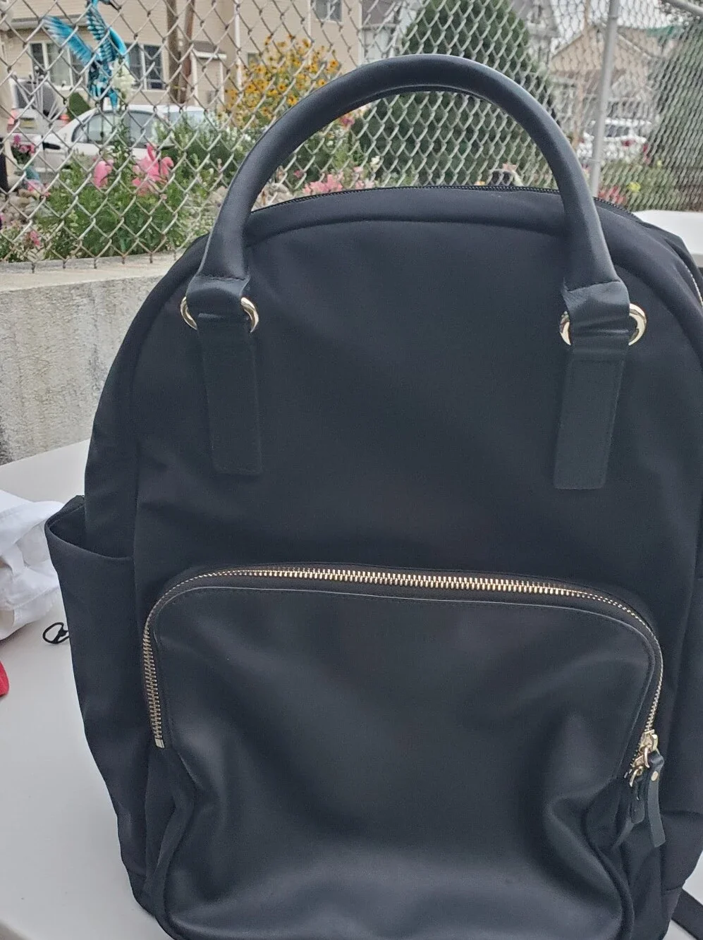 Lo & Sons Black Backpack with Gold Zipper Accents